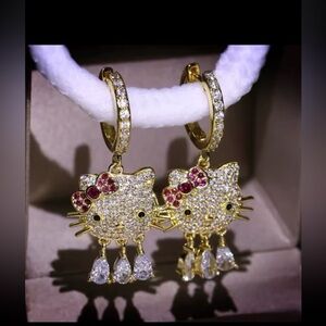 Gorgeous 18kt gold plated hello kitty earrings with swarovski elements